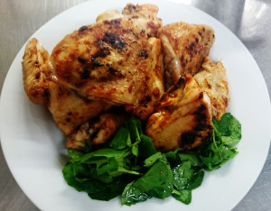 The reasons it looks like there is a lot of chicken on this plate is that there is a lot of chicken on this plate. It's an entire jointed chicken.